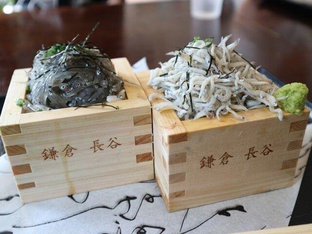 raw shirasu and boiled shirasu in boxes