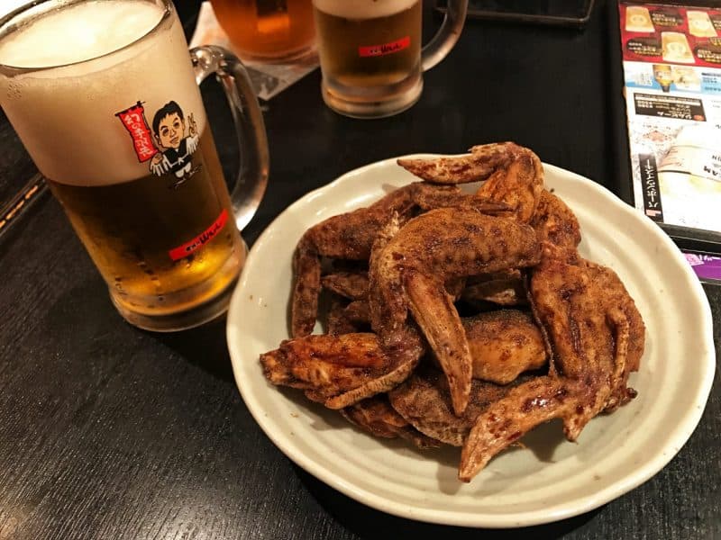 tebasaki and beer in a Japanese Izakaya