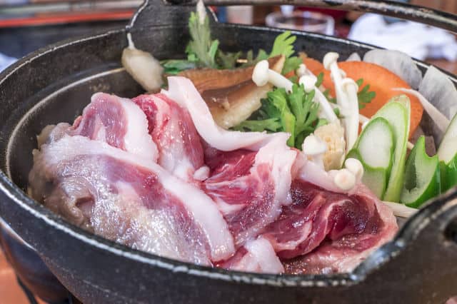 What is the difference between Botan Nabe and Shishi Nabe?