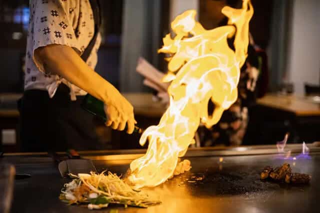 chef showing off on hibachi restaurants