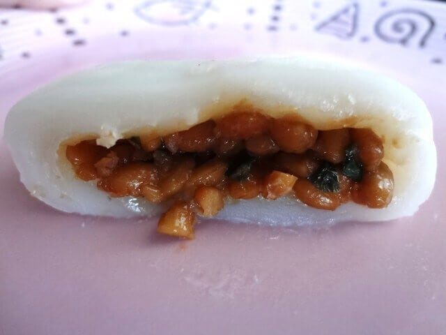 close up picture of the inside of Natto mochi 