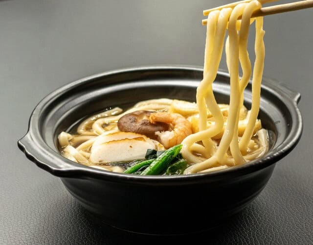 nabeyaki udon with chopstick