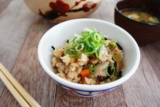 jyuicy with spring onions on top